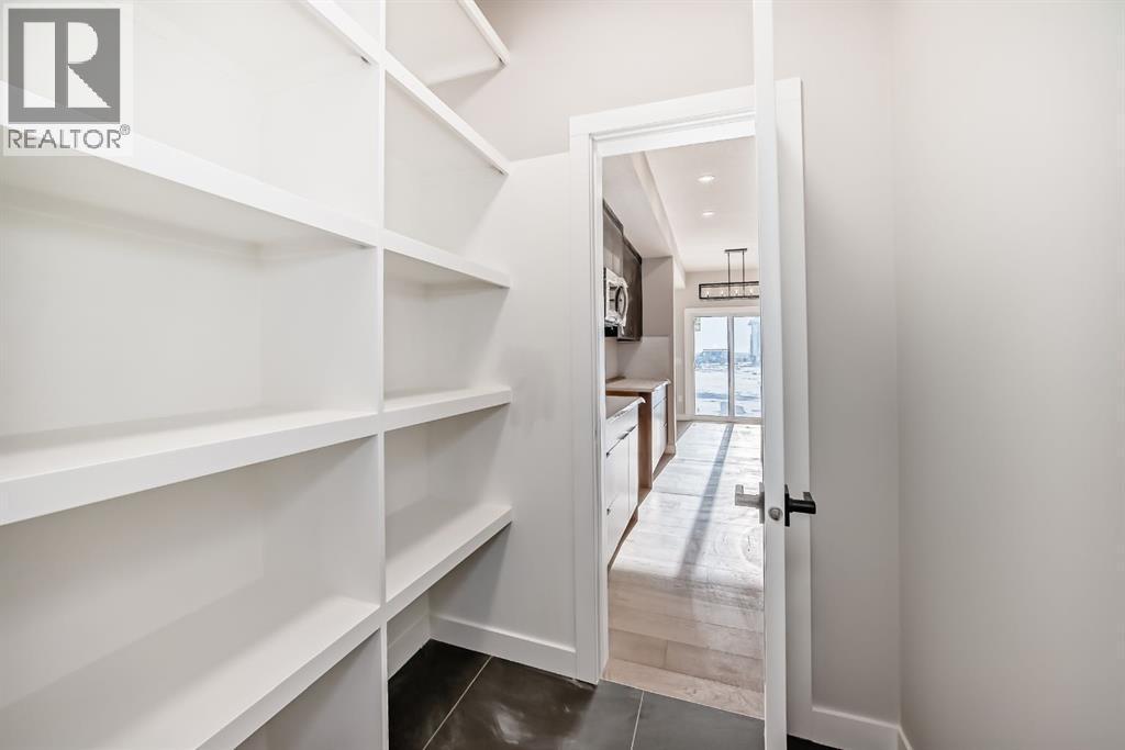 504 Heritage Boulevard, Cochrane, AB - Indoor With Storage