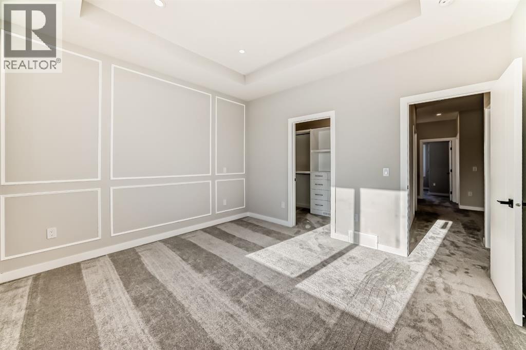 504 Heritage Boulevard, Cochrane, AB - Indoor Photo Showing Other Room