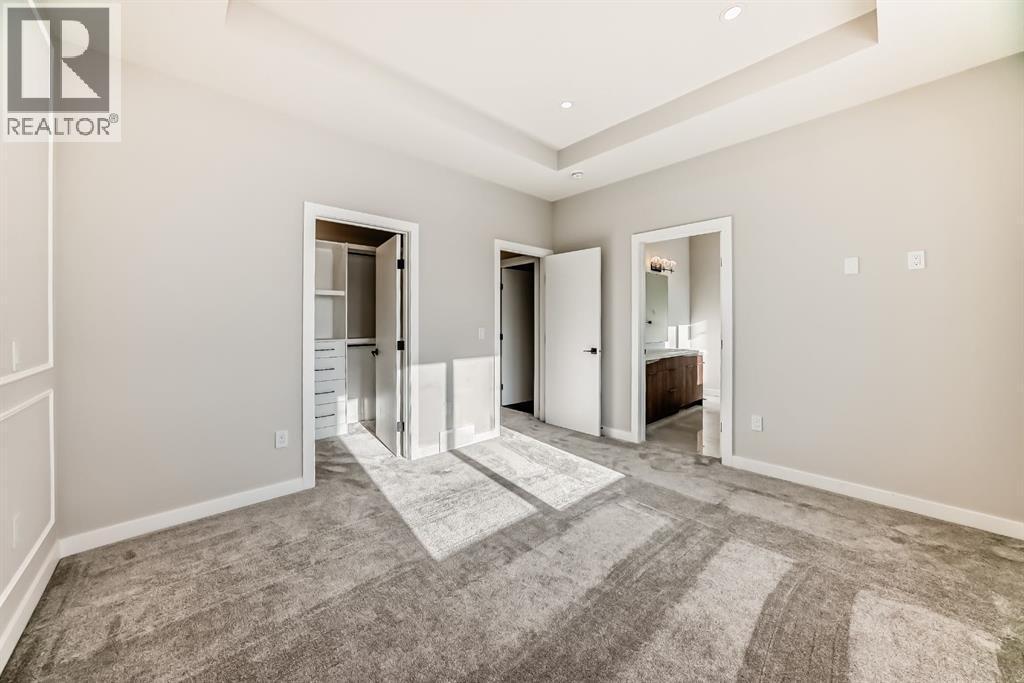 504 Heritage Boulevard, Cochrane, AB - Indoor Photo Showing Other Room