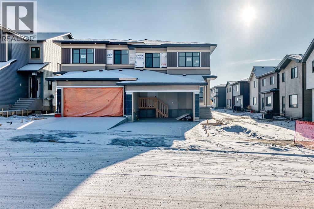 504 Heritage Boulevard, Cochrane, AB - Outdoor With Facade