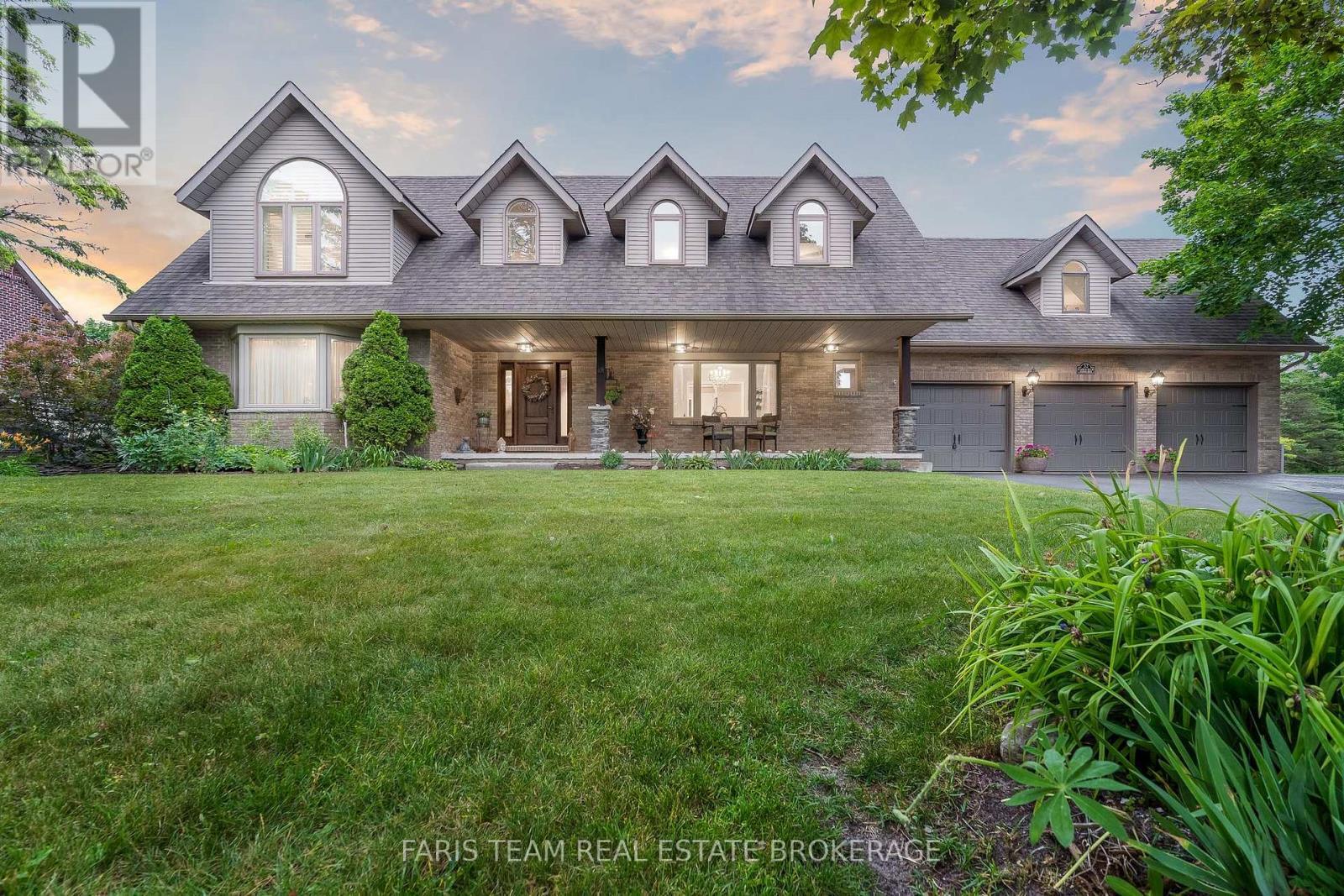 32 Cairns Boulevard, Springwater, ON - Outdoor With Deck Patio Veranda With Facade
