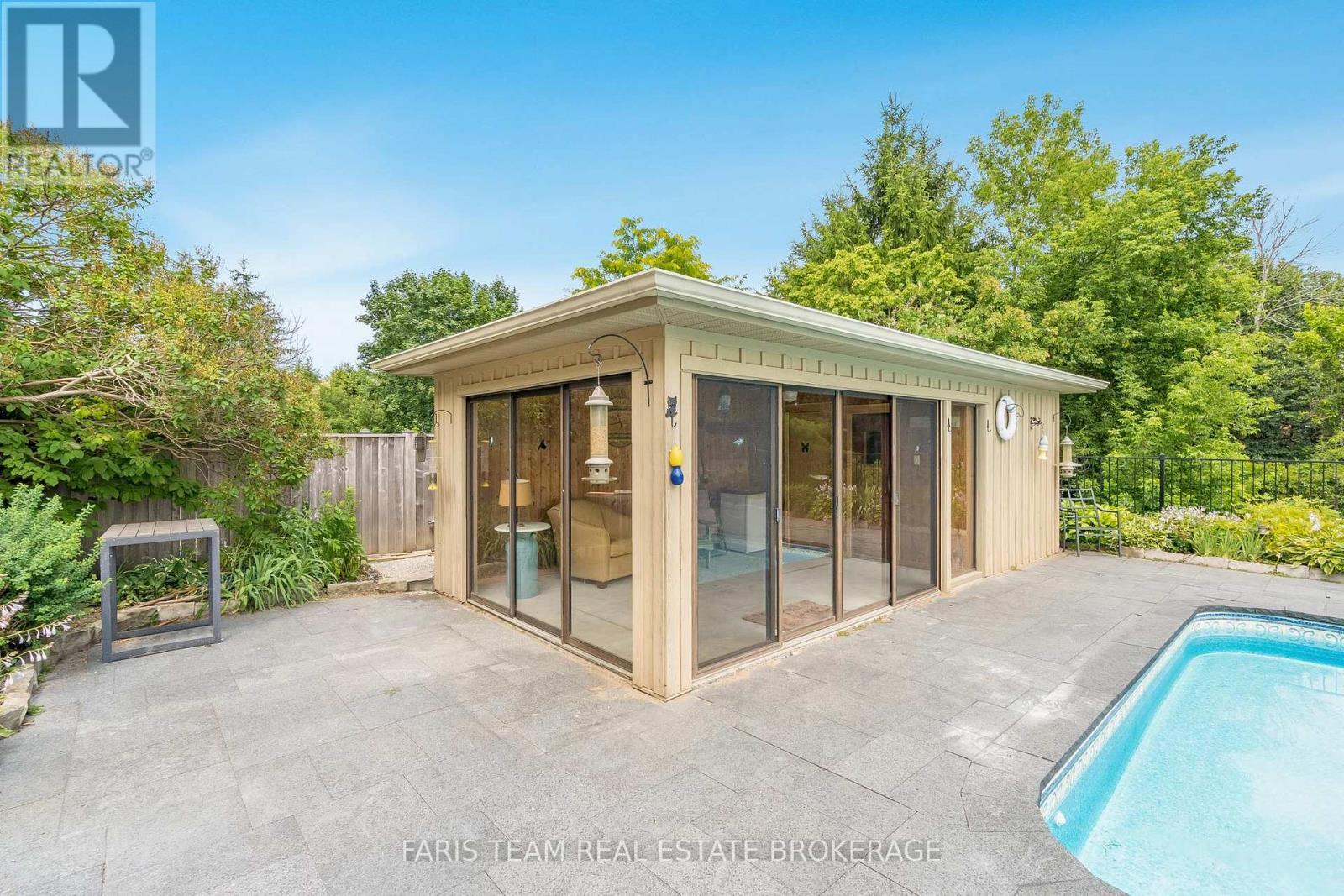 32 Cairns Boulevard, Springwater, ON - Outdoor With In Ground Pool