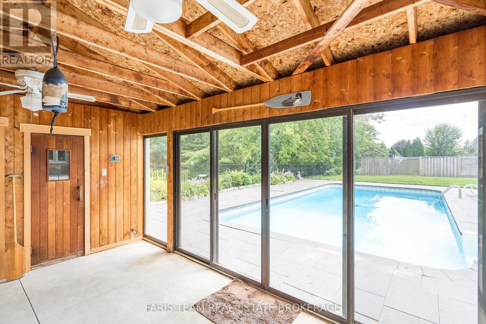 32 Cairns Boulevard, Springwater, ON - Indoor Photo Showing Other Room With In Ground Pool
