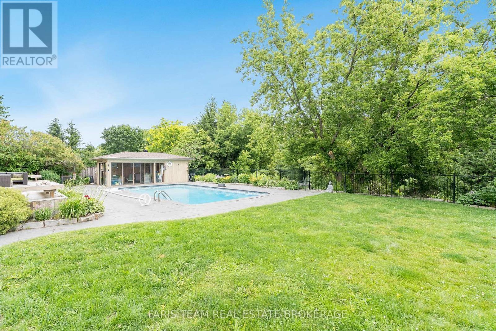 32 Cairns Boulevard, Springwater, ON - Outdoor With In Ground Pool