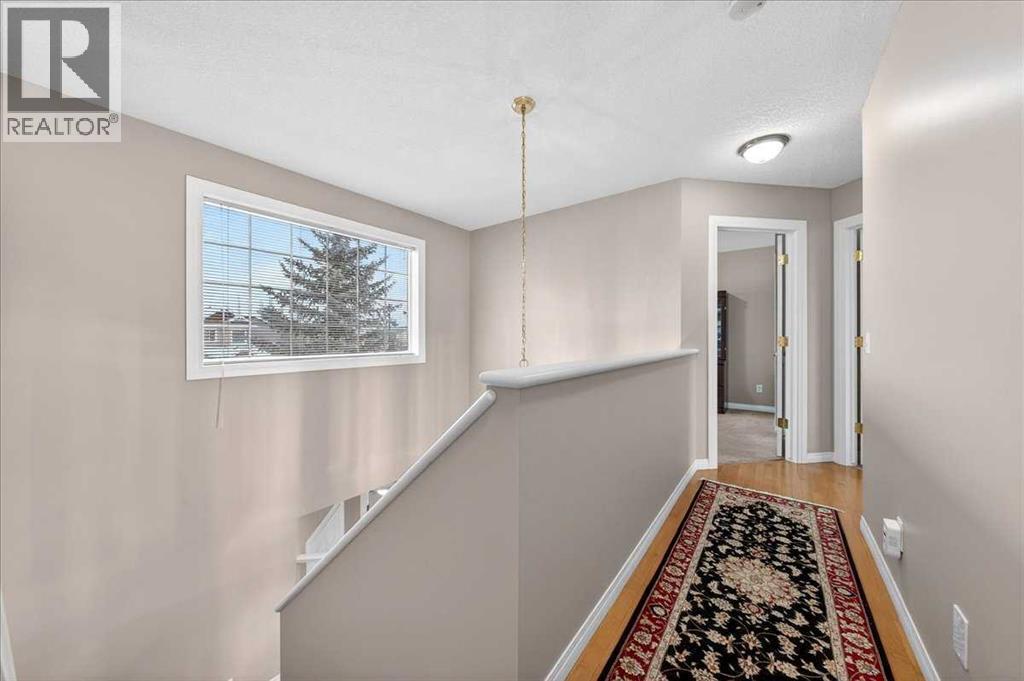 206 Cougarstone Circle Sw, Calgary, AB - Indoor Photo Showing Other Room