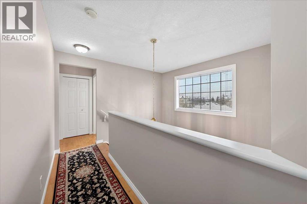206 Cougarstone Circle Sw, Calgary, AB - Indoor Photo Showing Other Room