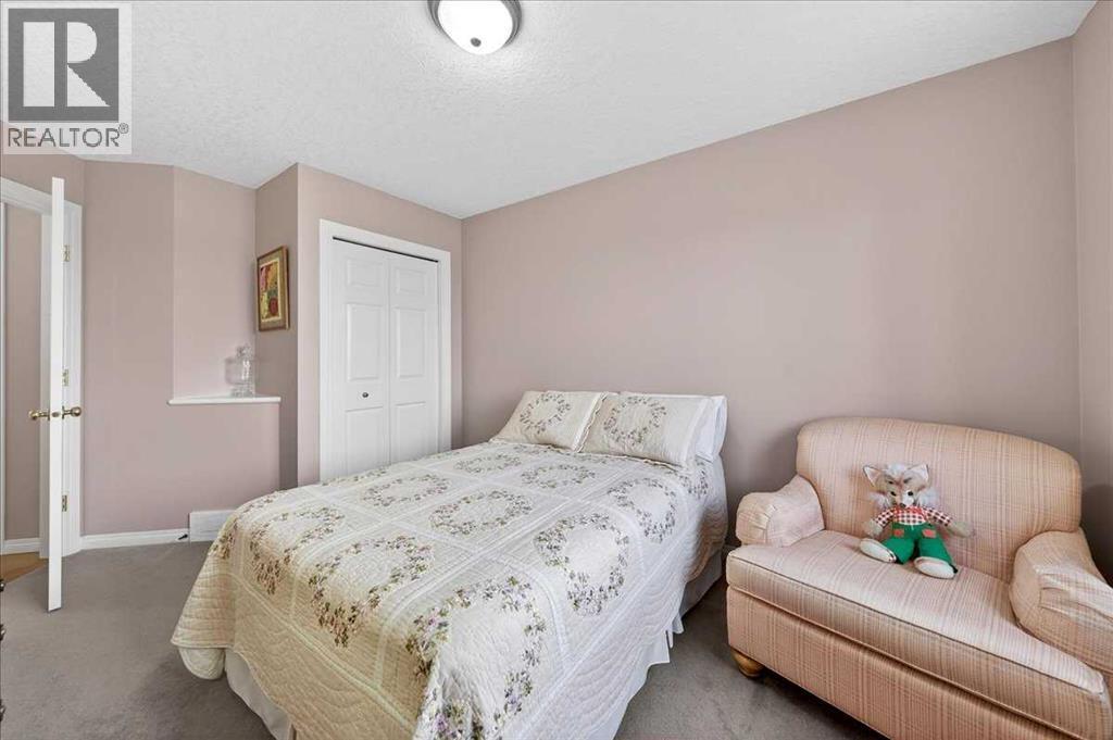 206 Cougarstone Circle Sw, Calgary, AB - Indoor Photo Showing Bedroom