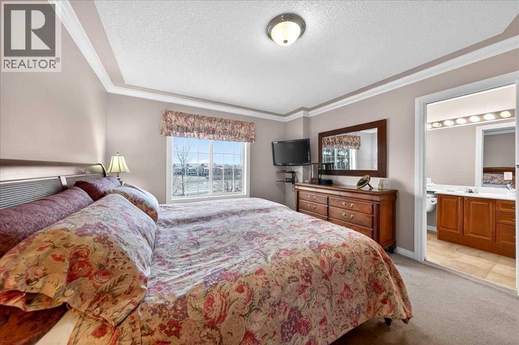 206 Cougarstone Circle Sw, Calgary, AB - Indoor Photo Showing Bedroom