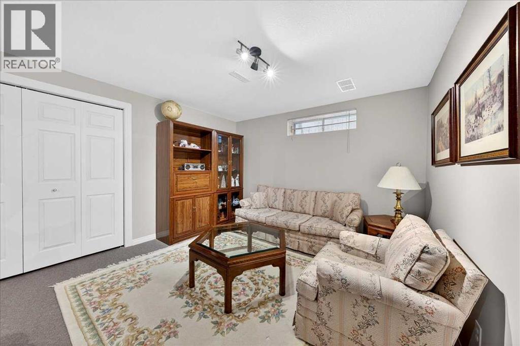 206 Cougarstone Circle Sw, Calgary, AB - Indoor Photo Showing Other Room