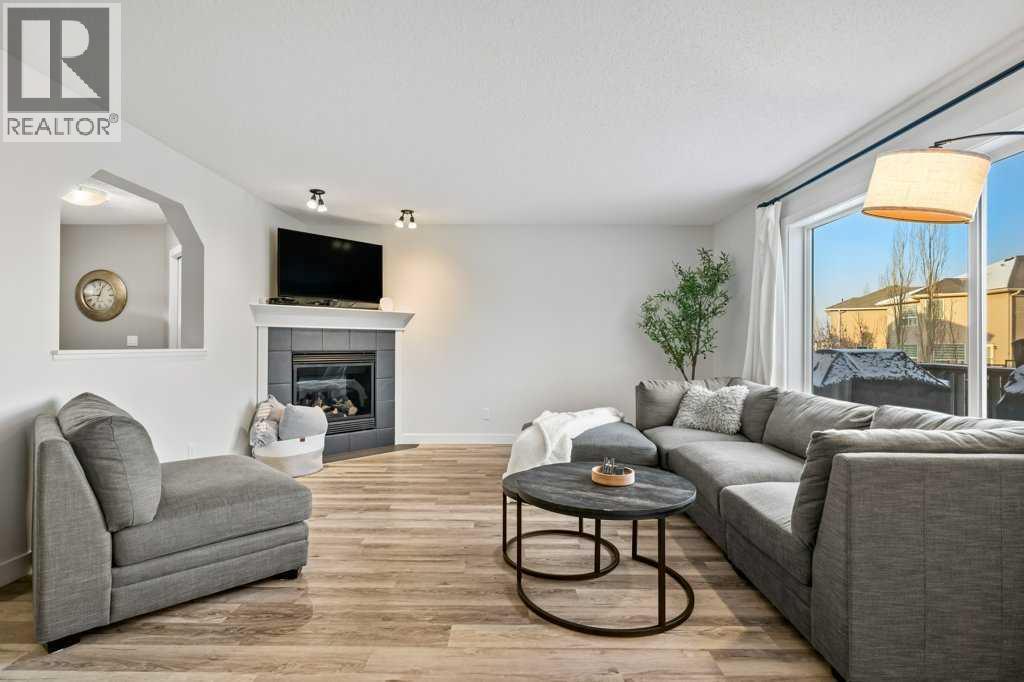 141 Lavender Link, Chestermere, AB - Indoor Photo Showing Living Room With Fireplace
