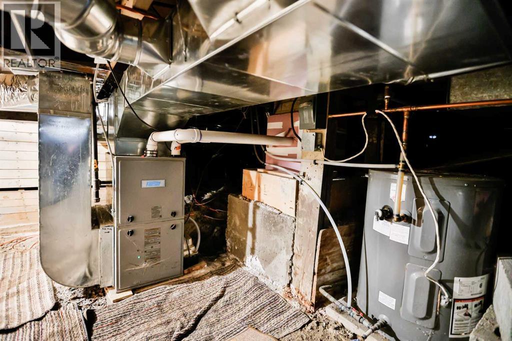 236 N 100 W, Raymond, AB - Indoor Photo Showing Basement