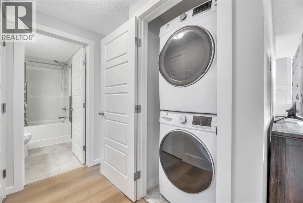 344 Cranbrook Square Se, Calgary, AB - Indoor Photo Showing Laundry Room