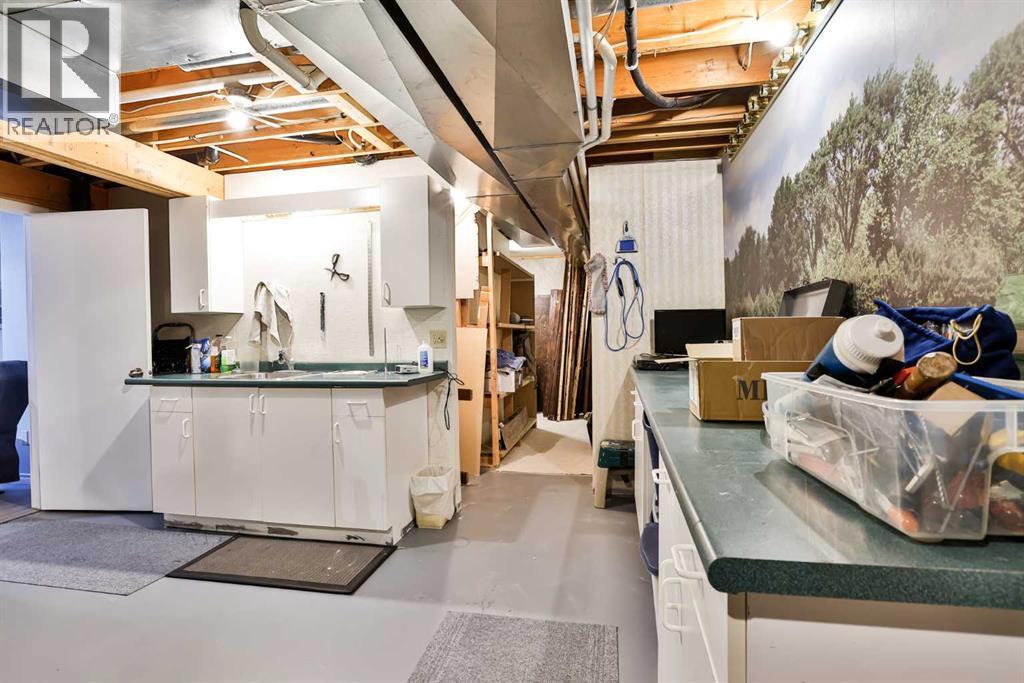 2, 135 Jerry Potts Boulevard W, Lethbridge, AB - Indoor Photo Showing Basement