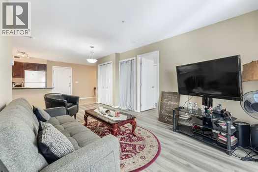 215, 355 Taralake Way Ne, Calgary, AB - Indoor Photo Showing Living Room