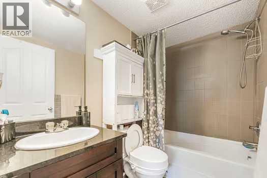 215, 355 Taralake Way Ne, Calgary, AB - Indoor Photo Showing Bathroom