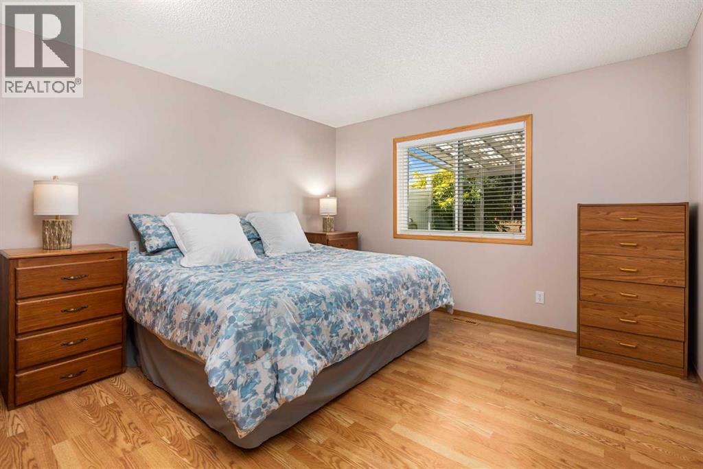 17, 1200 Milt Ford Lane, Carstairs, AB - Indoor Photo Showing Bedroom