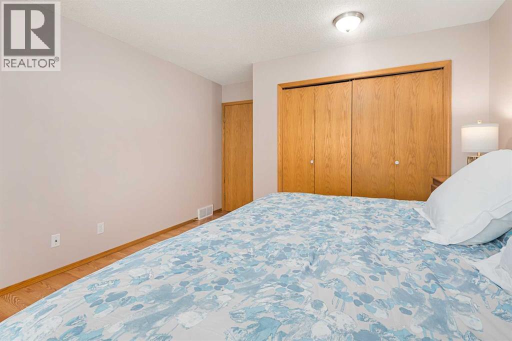17, 1200 Milt Ford Lane, Carstairs, AB - Indoor Photo Showing Bedroom