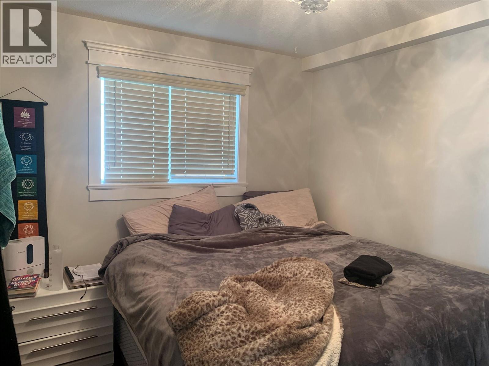 Bedroom on main when owner was living there - 3155 Gordon Drive Unit# 407, Kelowna, BC - Indoor Photo Showing Bedroom