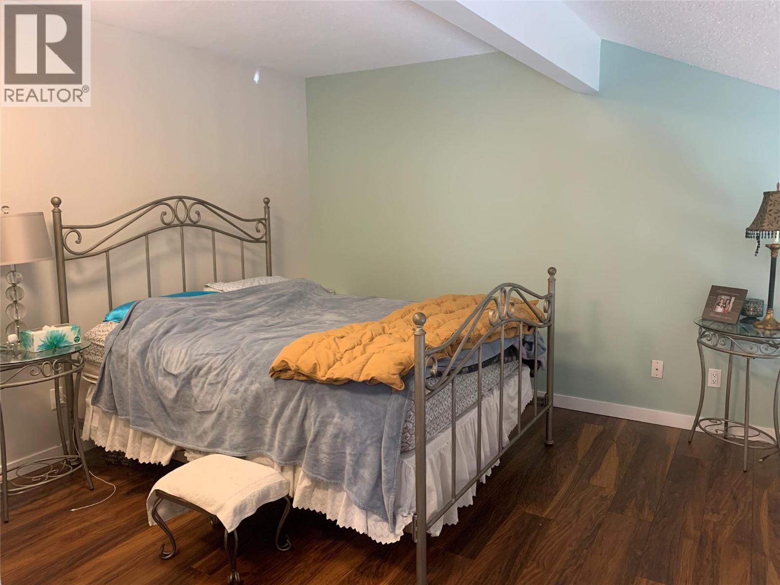 Loft bedroom when owner was living there - 3155 Gordon Drive Unit# 407, Kelowna, BC - Indoor Photo Showing Bedroom