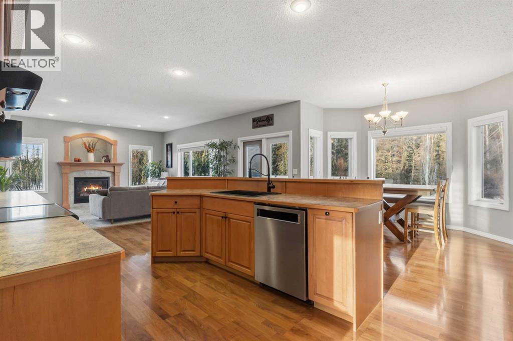 26 Park Point, Whitecourt, AB - Indoor Photo Showing Kitchen With Fireplace