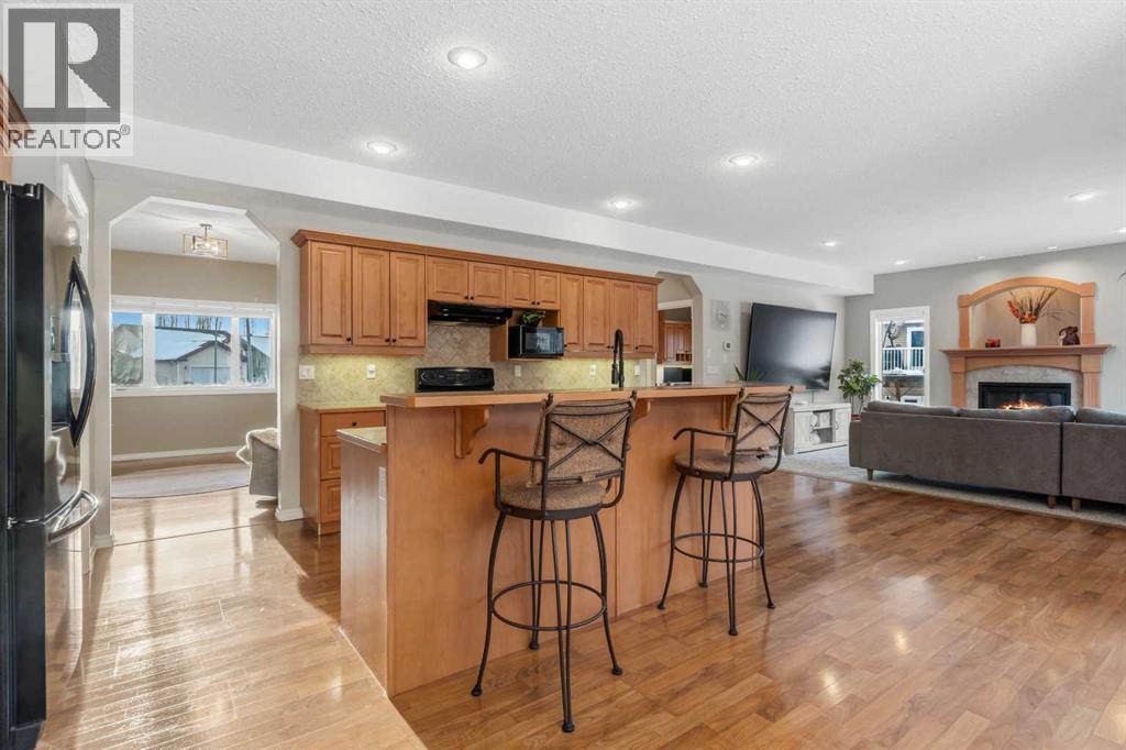 26 Park Point, Whitecourt, AB - Indoor Photo Showing Kitchen With Fireplace