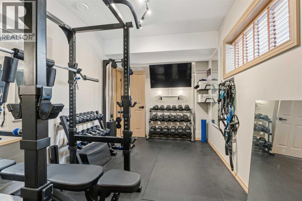26 Park Point, Whitecourt, AB - Indoor Photo Showing Gym Room