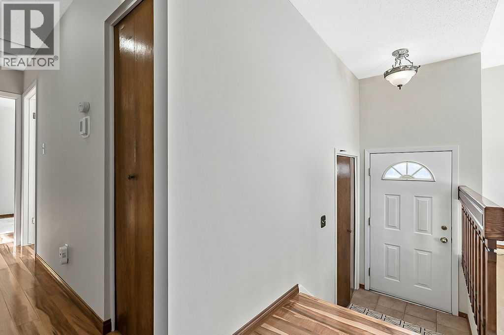 107 Lock Crescent, Okotoks, AB - Indoor Photo Showing Other Room