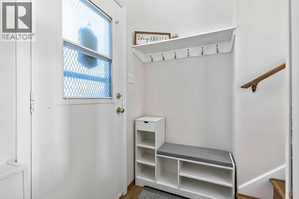 107 Lock Crescent, Okotoks, AB - Indoor Photo Showing Other Room