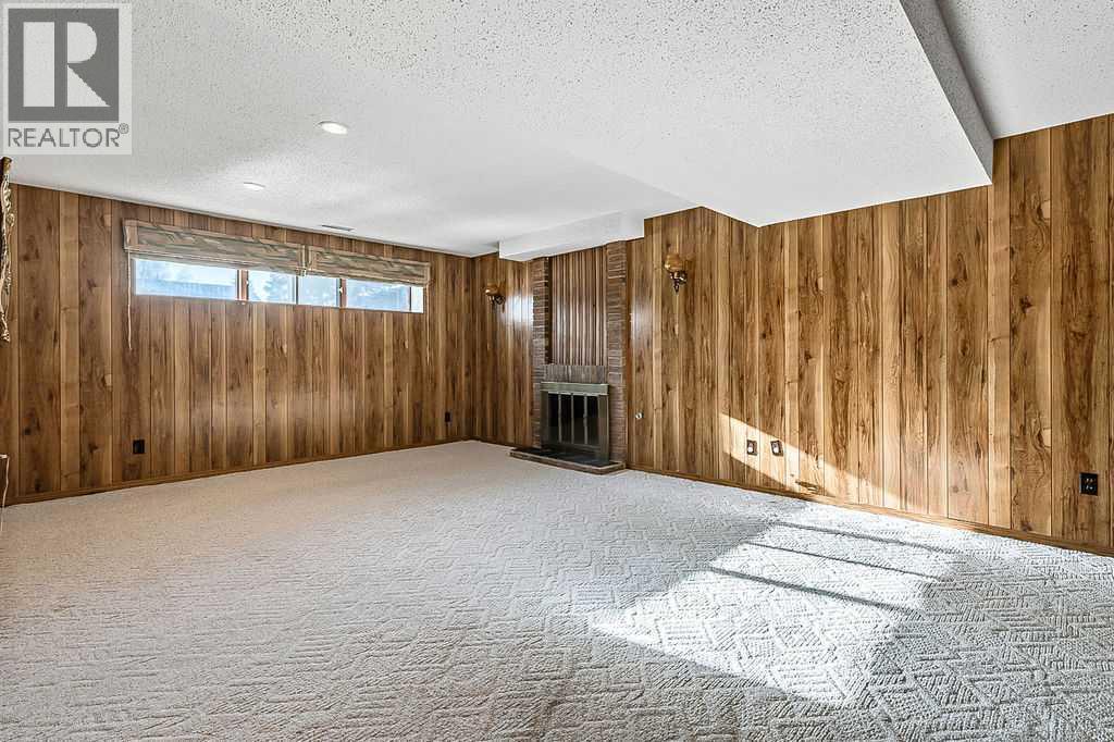 107 Lock Crescent, Okotoks, AB - Indoor Photo Showing Other Room