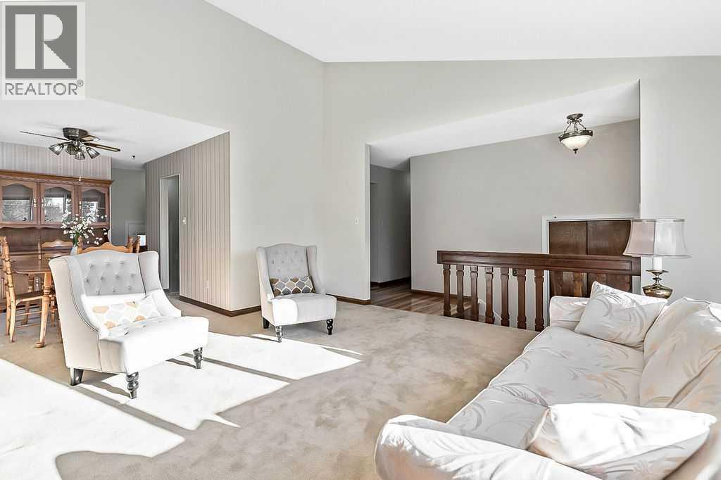 107 Lock Crescent, Okotoks, AB - Indoor Photo Showing Other Room