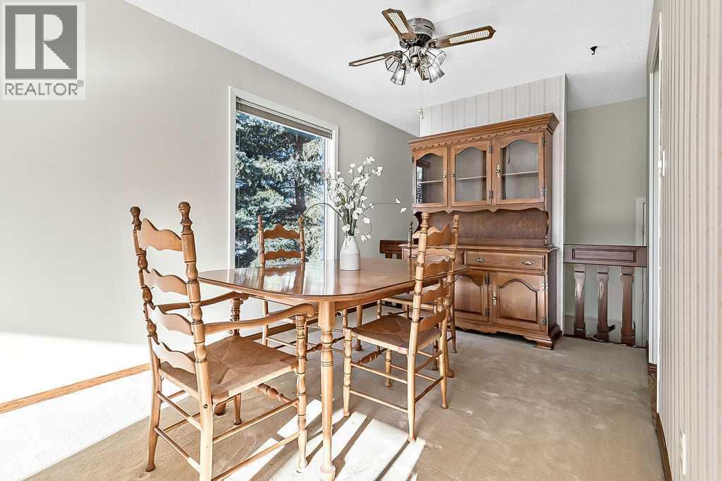 107 Lock Crescent, Okotoks, AB - Indoor Photo Showing Dining Room