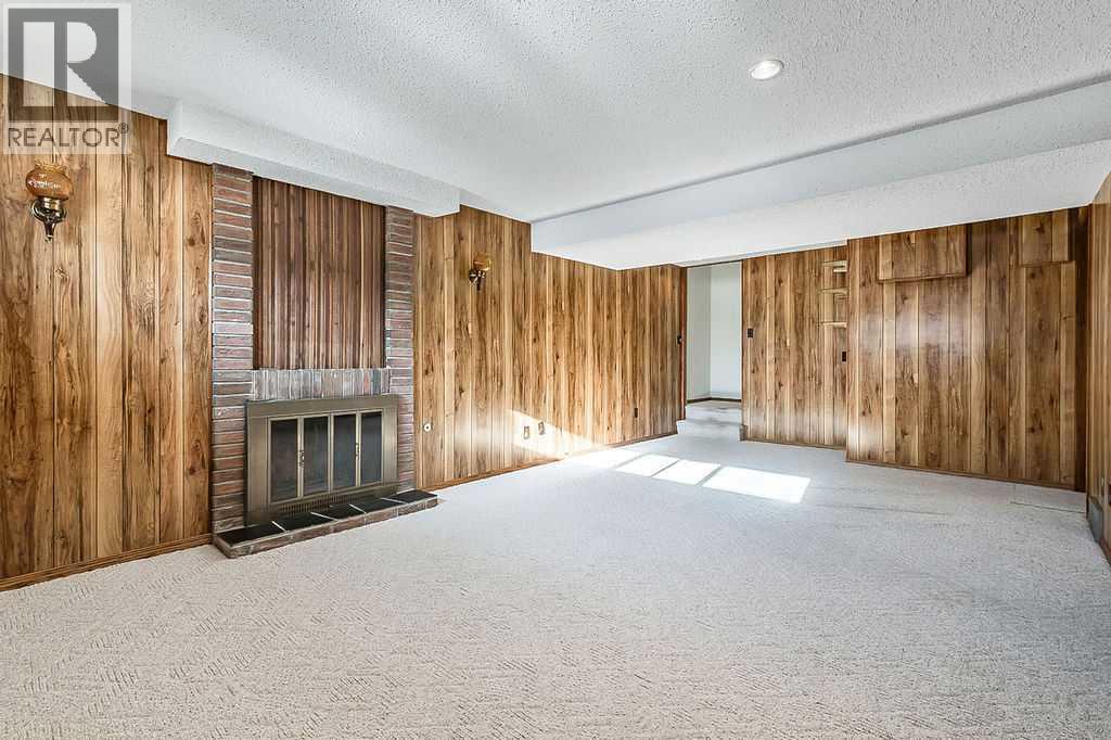 107 Lock Crescent, Okotoks, AB - Indoor Photo Showing Other Room