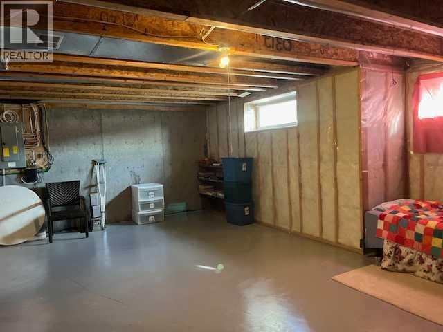 901 Nativity Bay, Rural Rocky View County, AB - Indoor Photo Showing Basement