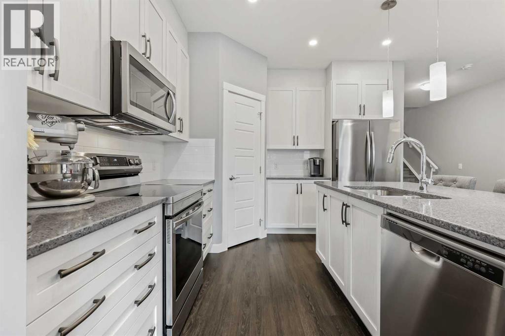 3 Sage Bluff Heights Nw, Calgary, AB - Indoor Photo Showing Kitchen With Stainless Steel Kitchen With Upgraded Kitchen
