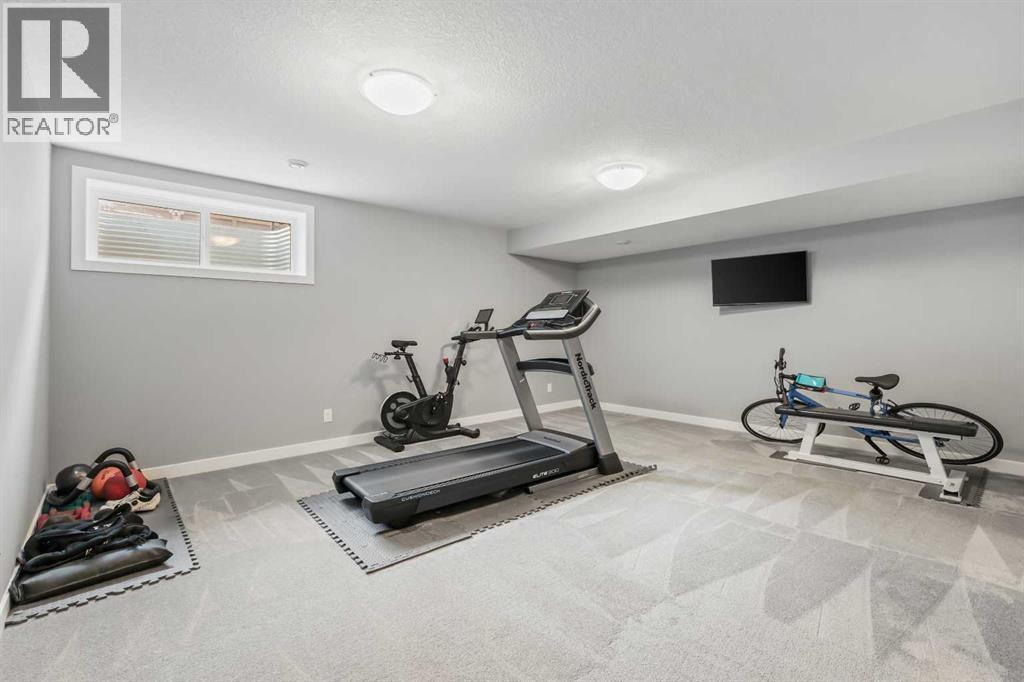 3 Sage Bluff Heights Nw, Calgary, AB - Indoor Photo Showing Gym Room