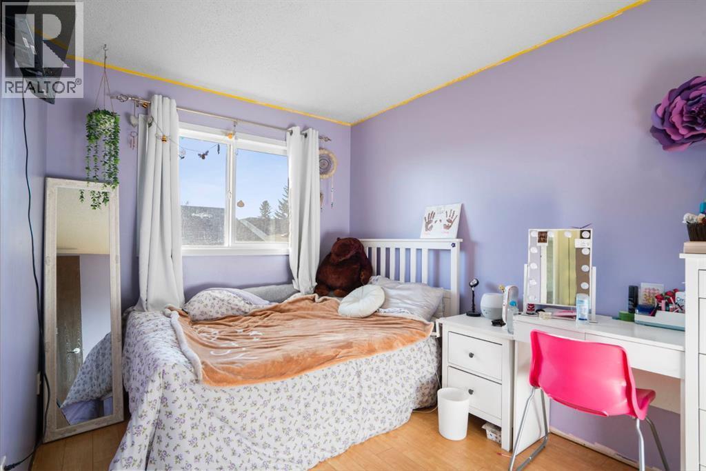 43 Applewood Drive Se, Calgary, AB - Indoor Photo Showing Bedroom