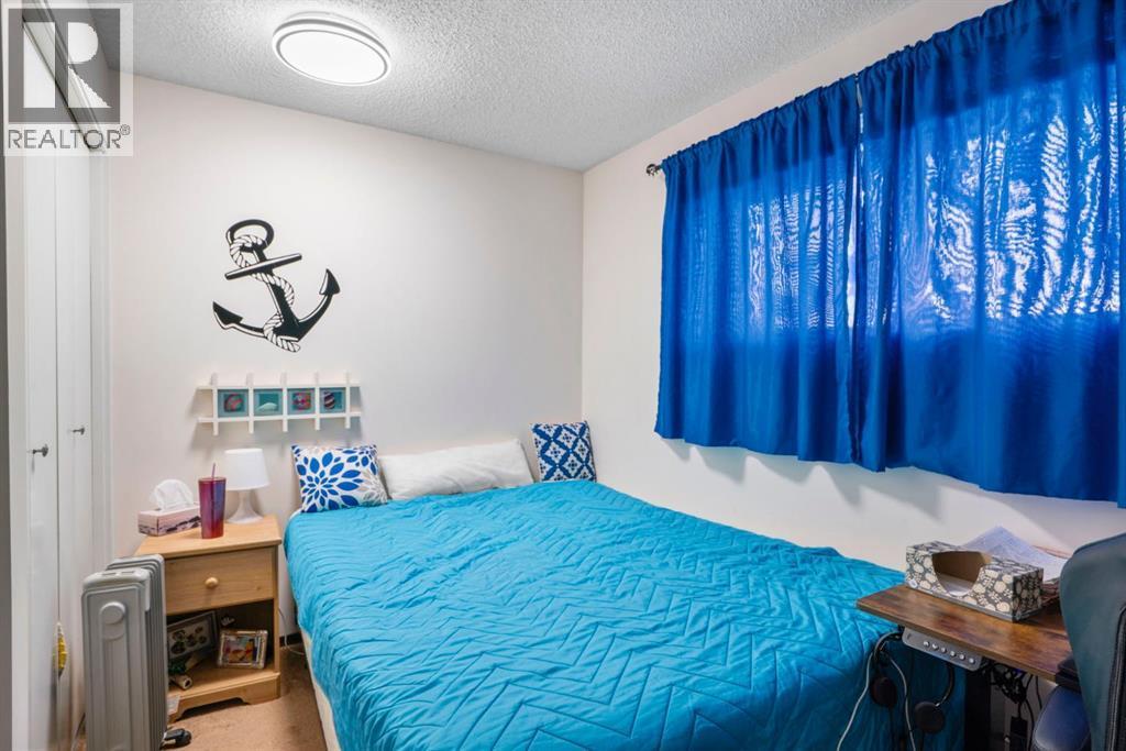 43 Applewood Drive Se, Calgary, AB - Indoor Photo Showing Bedroom