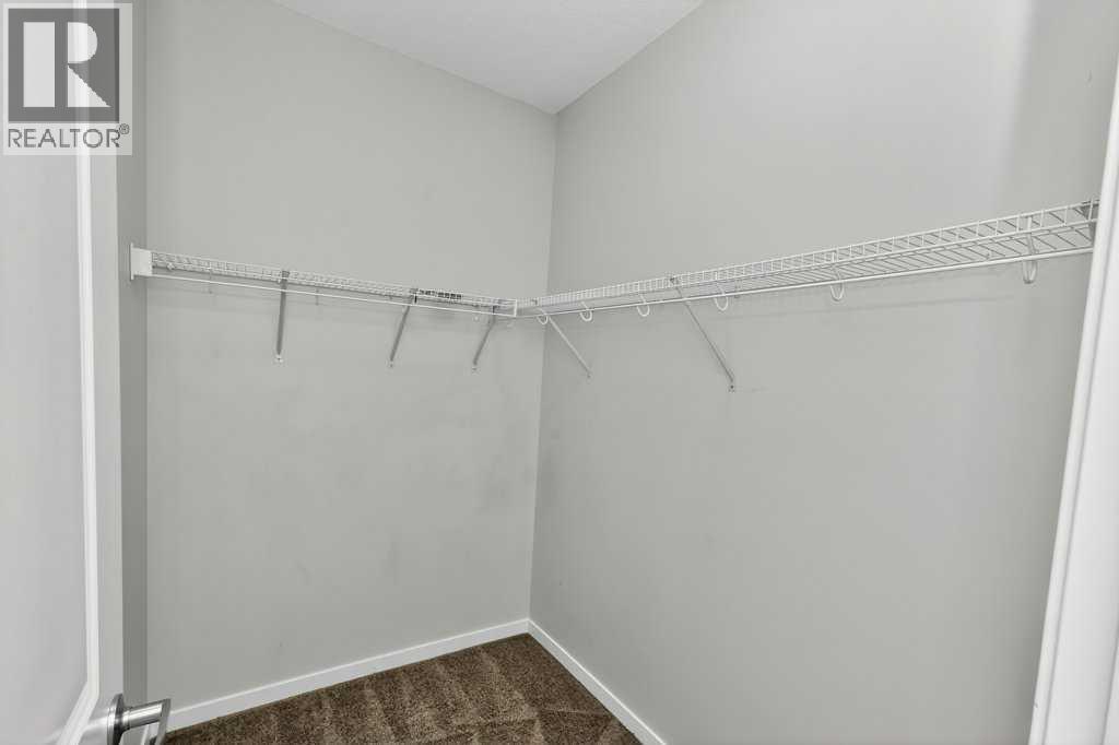 1207, 33 Carringham Gate Nw, Calgary, AB - Indoor With Storage