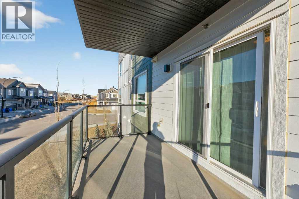 1207, 33 Carringham Gate Nw, Calgary, AB - Outdoor With Balcony With Exterior