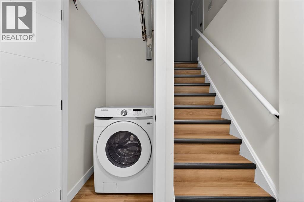 Washer - 420 Pinegreen Close Ne, Calgary, AB - Indoor Photo Showing Laundry Room
