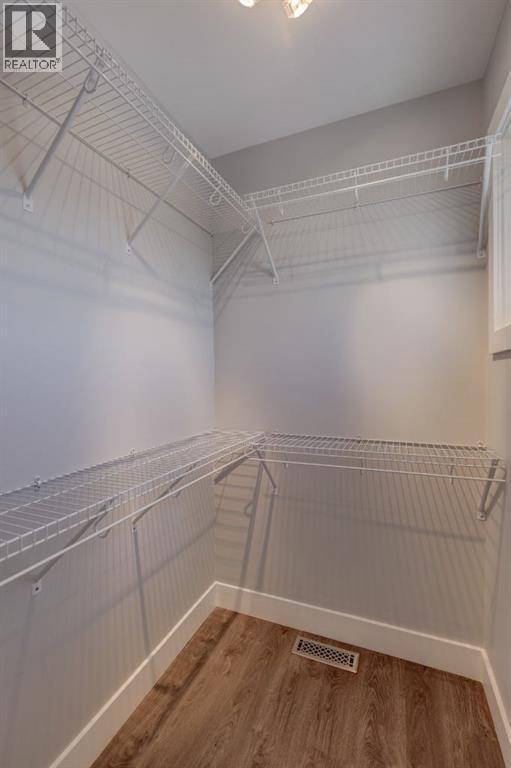 413 Albert Street Se, Airdrie, AB - Indoor With Storage