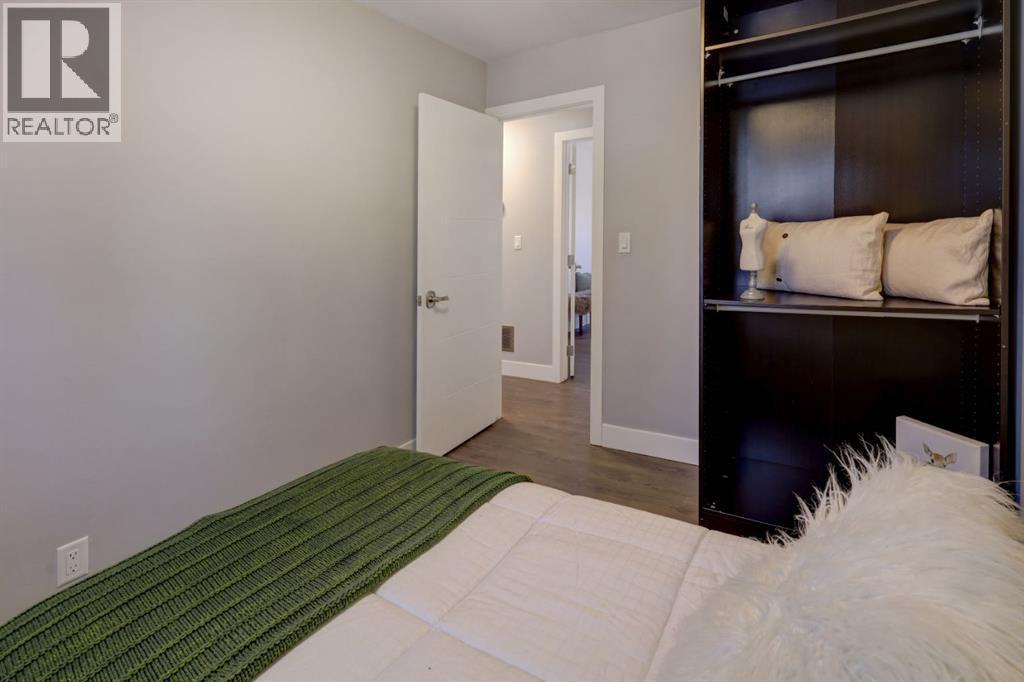 413 Albert Street Se, Airdrie, AB - Indoor Photo Showing Bedroom