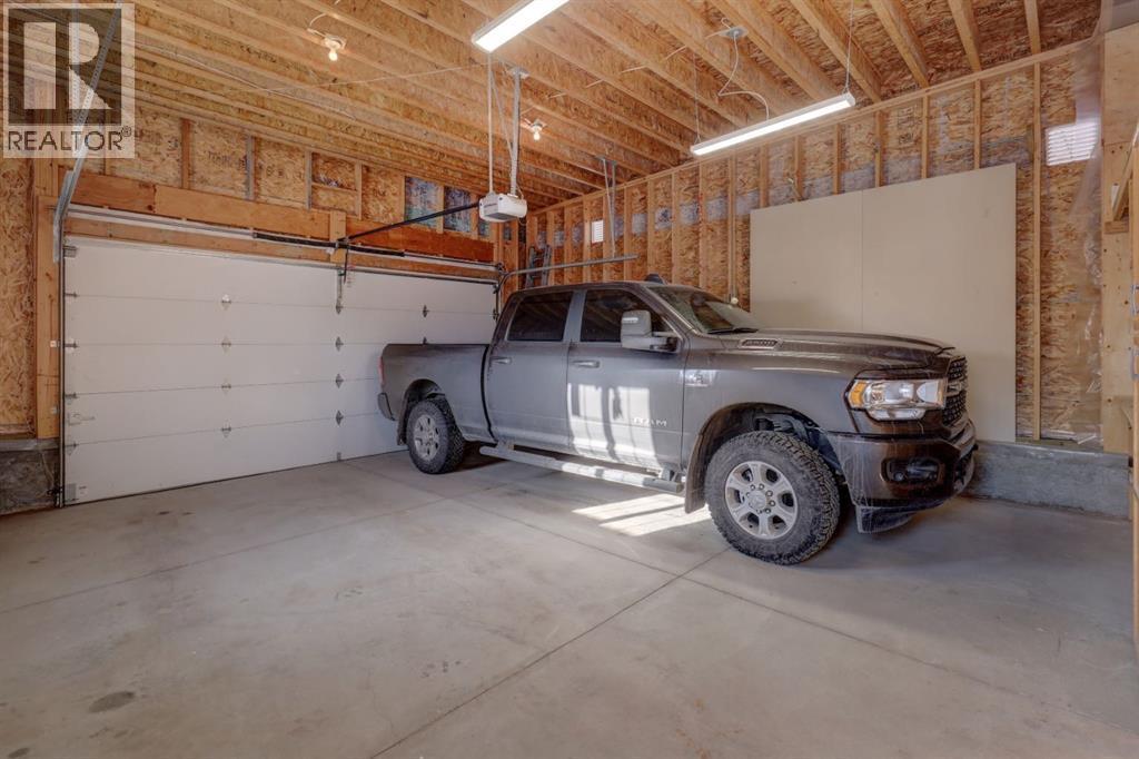 413 Albert Street Se, Airdrie, AB - Indoor Photo Showing Garage
