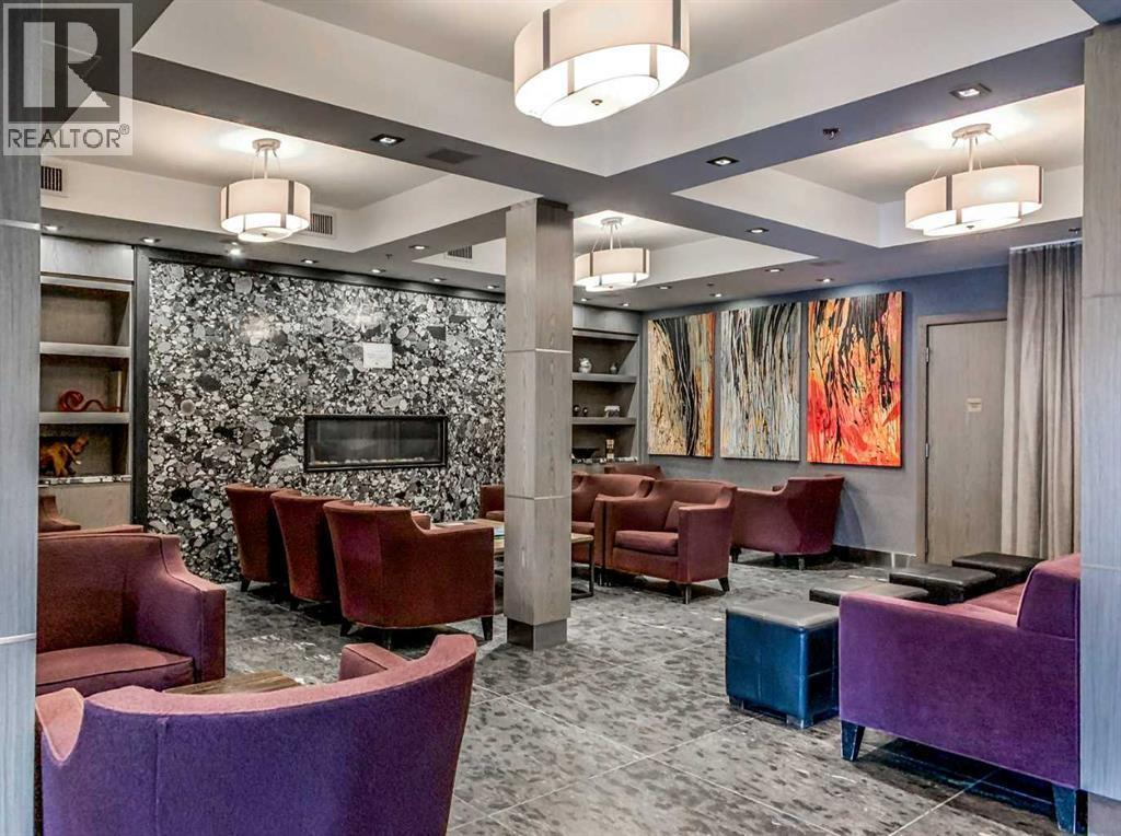 205 Rot. A, 901 Mountain Street, Canmore, AB - Indoor With Fireplace