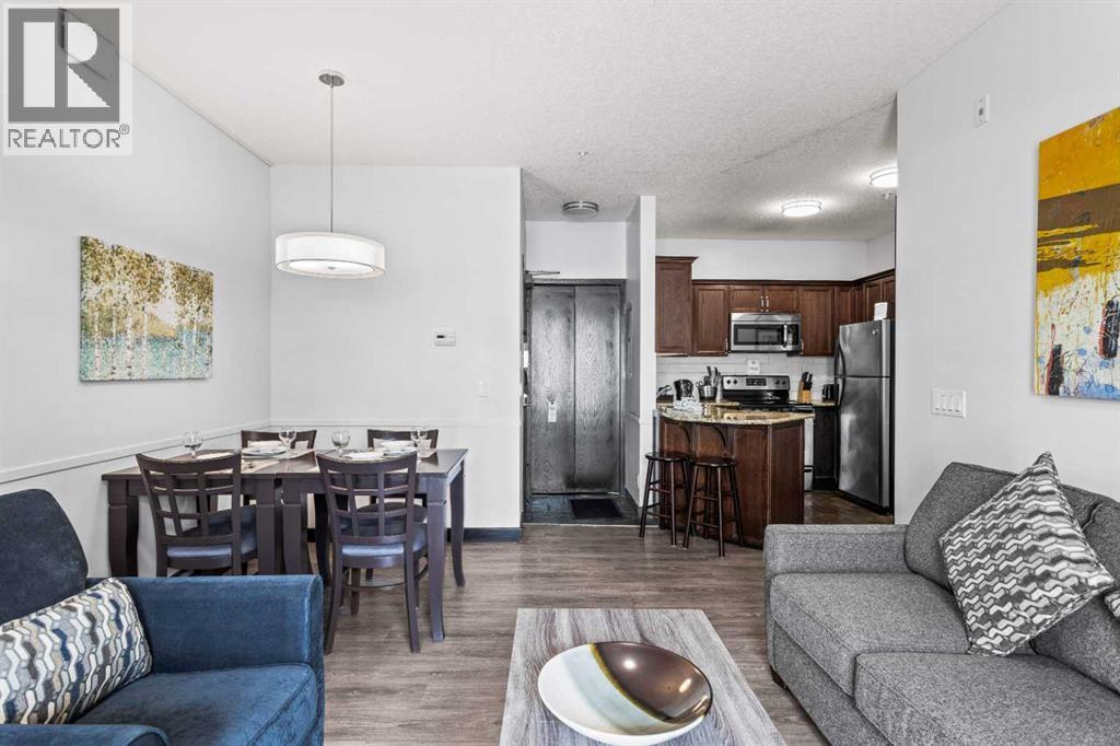 205 Rot. A, 901 Mountain Street, Canmore, AB - Indoor Photo Showing Living Room