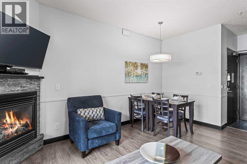 205 Rot. A, 901 Mountain Street, Canmore, AB - Indoor With Fireplace