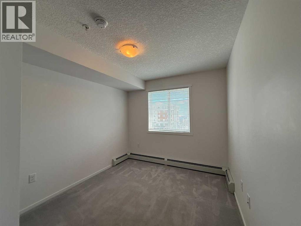 3419, 4641 128 Avenue Ne, Calgary, AB - Indoor Photo Showing Other Room