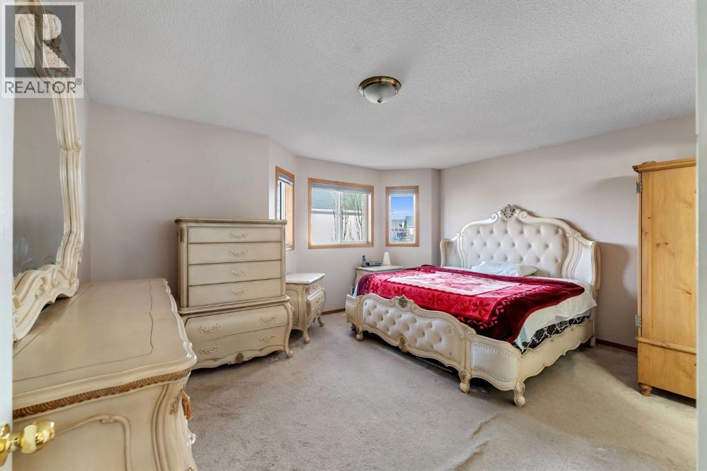 717 Coral Springs Boulevard Ne, Calgary, AB - Indoor Photo Showing Bedroom