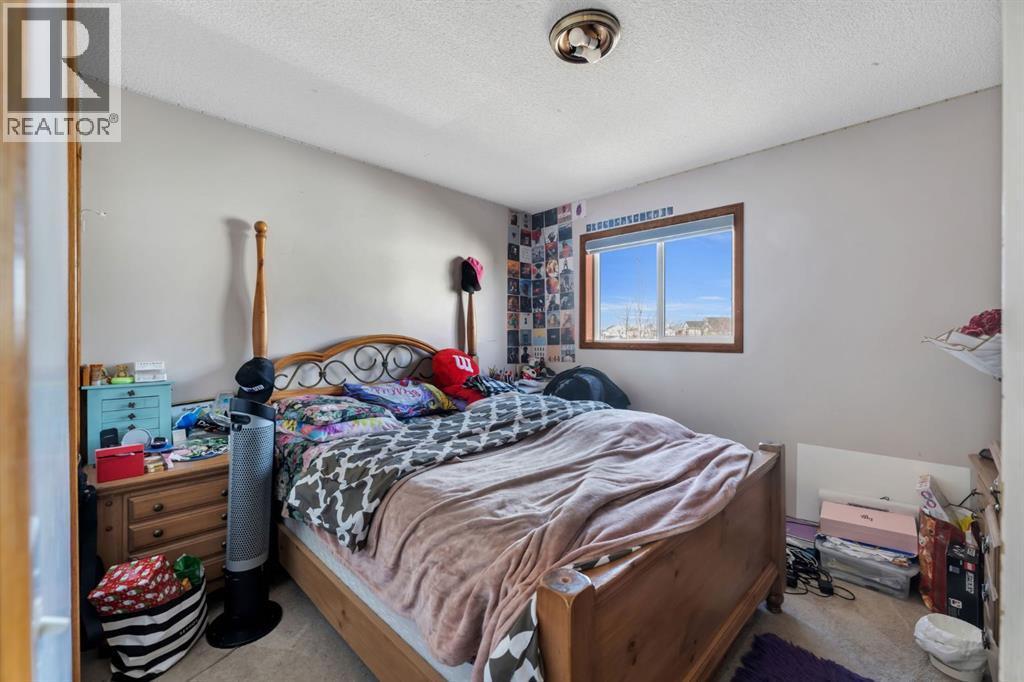717 Coral Springs Boulevard Ne, Calgary, AB - Indoor Photo Showing Bedroom