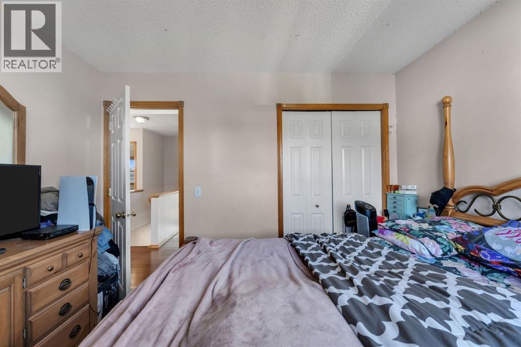 717 Coral Springs Boulevard Ne, Calgary, AB - Indoor Photo Showing Bedroom